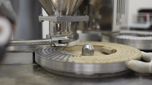 Nutritional supplement fills circular capsule rack in manufacturing lab