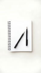 Blank Spiral Notebook with a Pen on a White Background, Perfect for Notes or Sketching