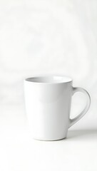 Fototapeta premium Blank White Coffee Mug on a White Background, Ideal for Branding or Custom Designs