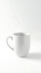 Fototapeta premium Blank White Coffee Mug on a White Background, Ideal for Branding or Custom Designs