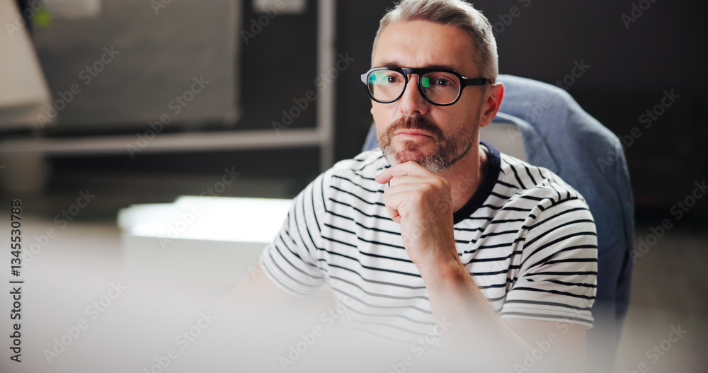Poster Online, night and mature man with computer, office and creative for web design with software or reading. Overtime, graphic designer and person with glasses in business, deadline and tech for project