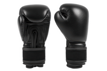 A pair of black leather boxing gloves presented on a black background in a studio shot view