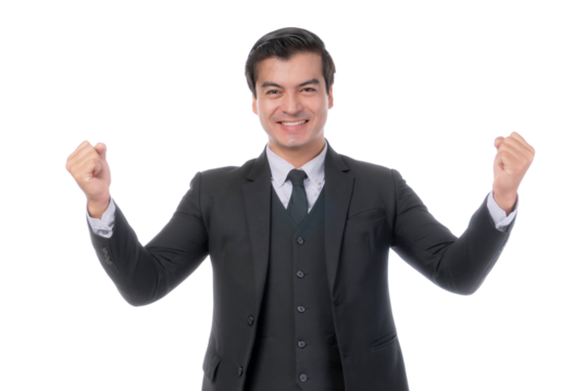 Excited young businessman in a black suit celebrating success with raised fists, smiling and standing isolated on a transparent background, concept of achievement, motivation, and business success
