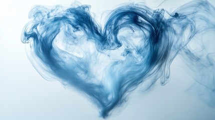 A heart formed from swirls of smoke in soft blue tones