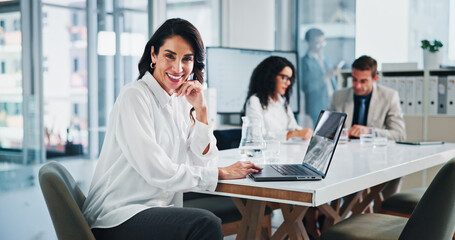 Meeting, businesswoman and portrait with laptop in office, about us or research for stock market. Boardroom, mature person or trader with smile for financial performance, risk management or corporate