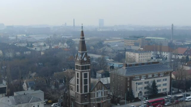 St. Teresa of Lisieux Church, misty urban skyline of Budapest, Hungary. Aerial drone, cityscape