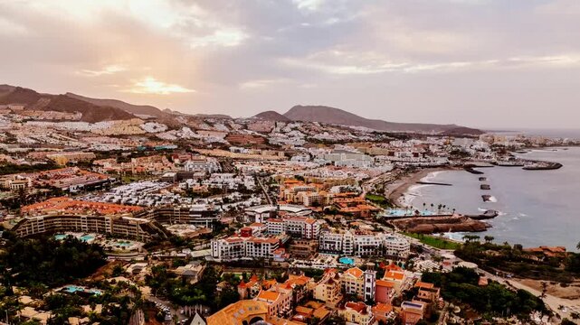 Dynamic hyperlapse of Costa Adeje, Tenerife, zooming in on Plaza del Duque mall