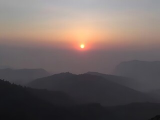 Sunrise over Majestic Mountain Range - Orange Sky, Serene Landscape, Nature's Beauty, Morning View, Scenic Panorama