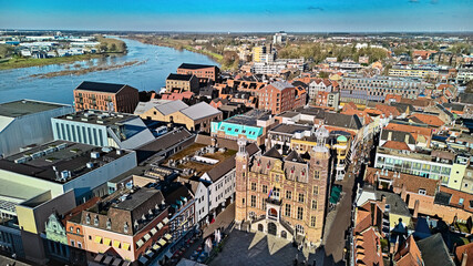 Venlo city center aerial skyline view from above, historic townhall, buildings architecture and Meuse river, Venlo town drone cityscape, the Netherlands