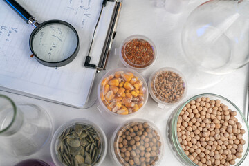 Analysis of cereal and legume seeds in the laboratory. Tests for GMO content, nitrates and seed germination. Top view.