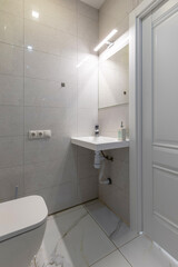 Modern Minimalist Bathroom with Small Sink