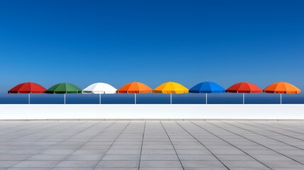 Colorful Beach Umbrellas Against Clear Blue Sky and Modern Architecture