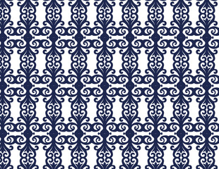 Fototapeta premium A symmetrical, repeating design of dark green swirls and floral motifs on a white backdrop.