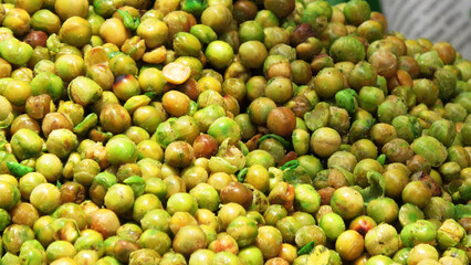 Roasted nuts ready for sale in a street shop