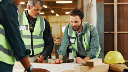 Carpentry, teamwork and men in workshop with documents for furniture, restoration and lumber manufacturing. Construction, meeting and carpenters planning with planks, timber and board for renovation