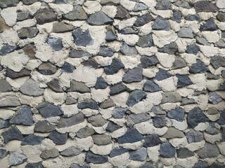 Tekstur batu besar yang di pecah hingga menjadi tatanan rapi, pengganti batu bata yang di buat untuk rumah jaman dahulu,termasuk rumah tua tapi sampai sekarang masih banyak penggunanya