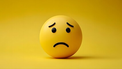 Fototapeta premium Sadness emoticon on yellow