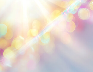 Abstract pastel background with bokeh lights and lens flare.