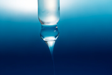 pipette with a drop of facial serum