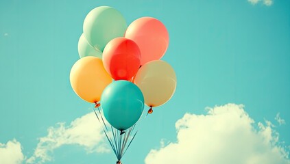 Colorful balloons float in the sky