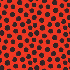 Seamless ladybug polka dots pattern. Black hand-drawn circles on orange red background. Abstract Random points ornament. Vector illustration for wallpaper, fabric print, vintage and retro style