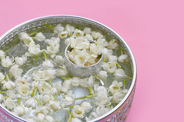 Water with jasmine flower, Songkran festival concept