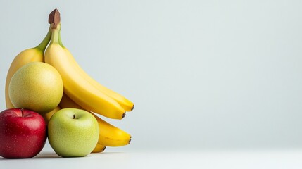 Fresh apples and bananas on white background