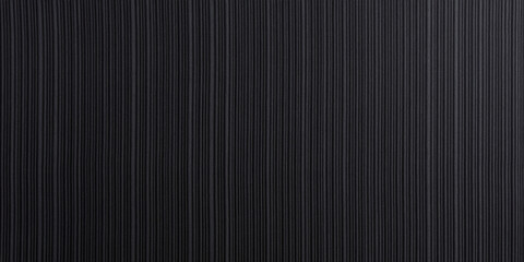 Obraz premium A classic pinstripe wool fabric texture background in charcoal gray. The fine vertical lines, subtle sheen, and tightly woven fibers convey a professional, business-like aesthetic, ideal for corporate