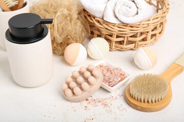 Set of bath supplies on light table, closeup