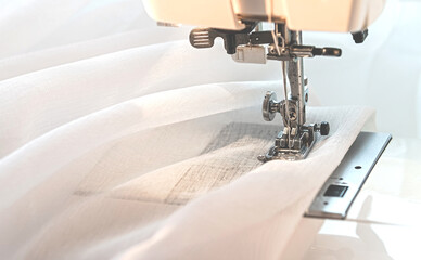 Machine with fabric. Close-up. Copy space.