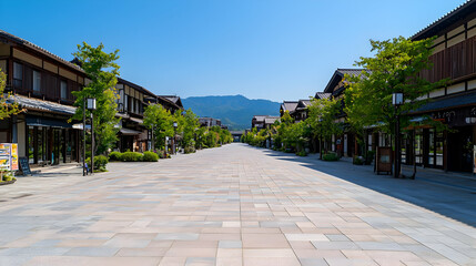 Obraz premium Stone Paved Street Lined With Traditional Japanese Buildings Under Clear Blue Sky During Daylight