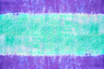 ie dye pattern hand dyed on cotton fabric abstract texture background.