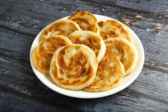 Homemade coin porotta or paratha famous Kerala recipes.