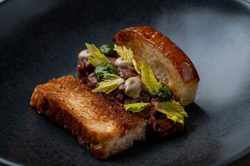 Savor a beautifully crafted culinary delight at a contemporary European restaurant. This dish showcases expertly prepared ingredients, adding a unique twist to classic flavors