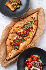 Enjoy a culinary journey filled with delectable European flavors, beautifully presented dishes, and fresh ingredients, perfect for a cozy dining setting with friends