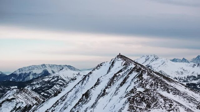 snow covered mountain at twilight