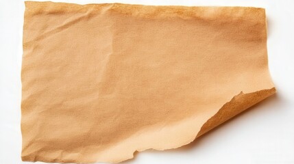 Obraz premium A crumpled, textured sheet of brown paper with a torn edge, showcasing a warm, earthy tone, suitable for various creative uses.