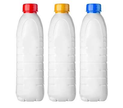 Three white plastic bottles with colorful caps on white background - Powered by Adobe