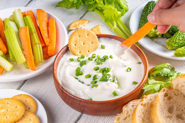 Cottage cheese dip with vegetables and crackers
