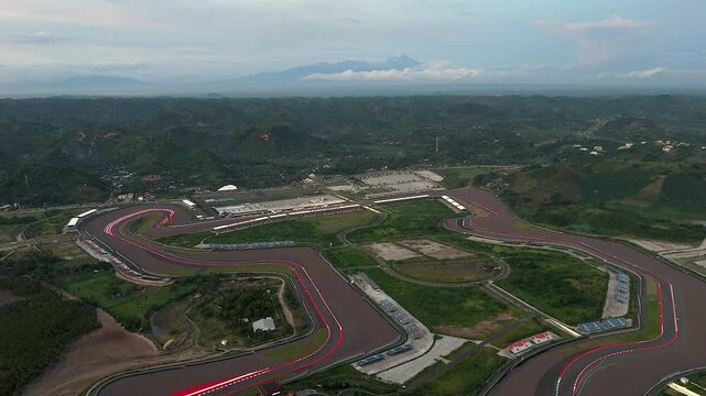 Humid hazy flyover of international motorcycle race track on Lombok