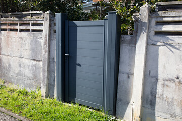 small gray door pedestrian modern grey classic metal home gate at entrance of house garden