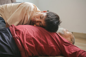Young Man Listening To Lungs For Breathe Check And Saving Grandfather