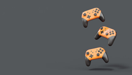 Realistic orange video game joysticks or gamepads on black background © Vasyl Onyskiv
