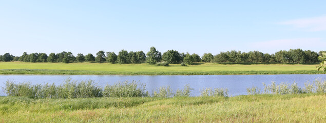 Beautiful river landscape. Banner river Pripyat in summer.