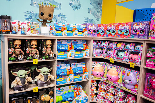 Colorful display of popular toy characters and products on store shelves