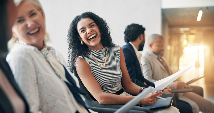 Business, laughing and audience in seminar, group and colleagues in workshop for training or meeting. Conference, information and coworkers with notes for presentation, crowd and people in boardroom