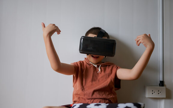 Fototapeta A child playing a virtual reality game, fully immersed in an exciting digital world  