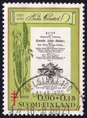 Finnish postage stamp honoring Pehr Gadd, depicting historical agricultural literature with...