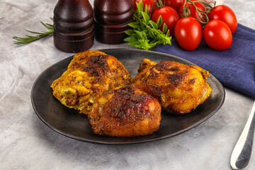 Roasted chicken thighs  with spices