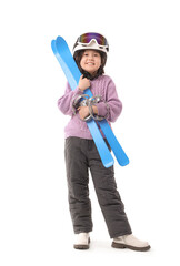 Little Asian girl with skis on white background